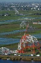 Typhoon damages power transmission towers